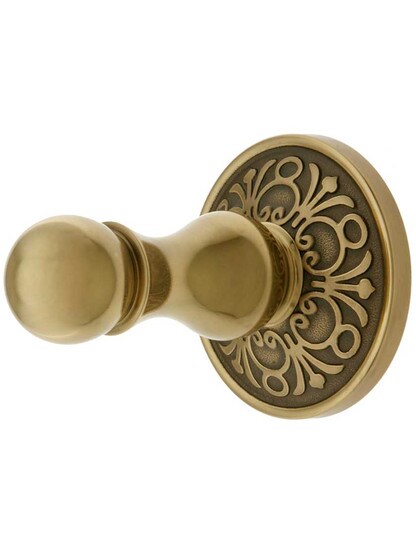 Solid Brass Single Hook Post with Lancaster Rosette in Antique Brass.